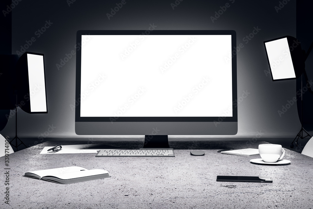 White computer screen in photo studio