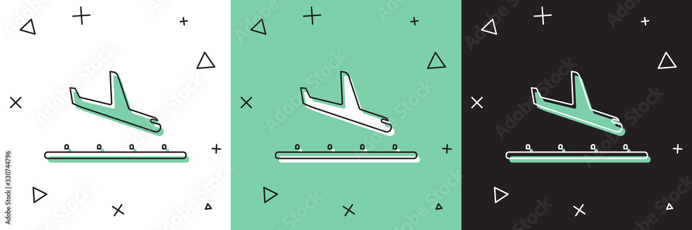 将飞机着陆图标隔离在白色和绿色、黑色背景上。飞机运输符号。Vec