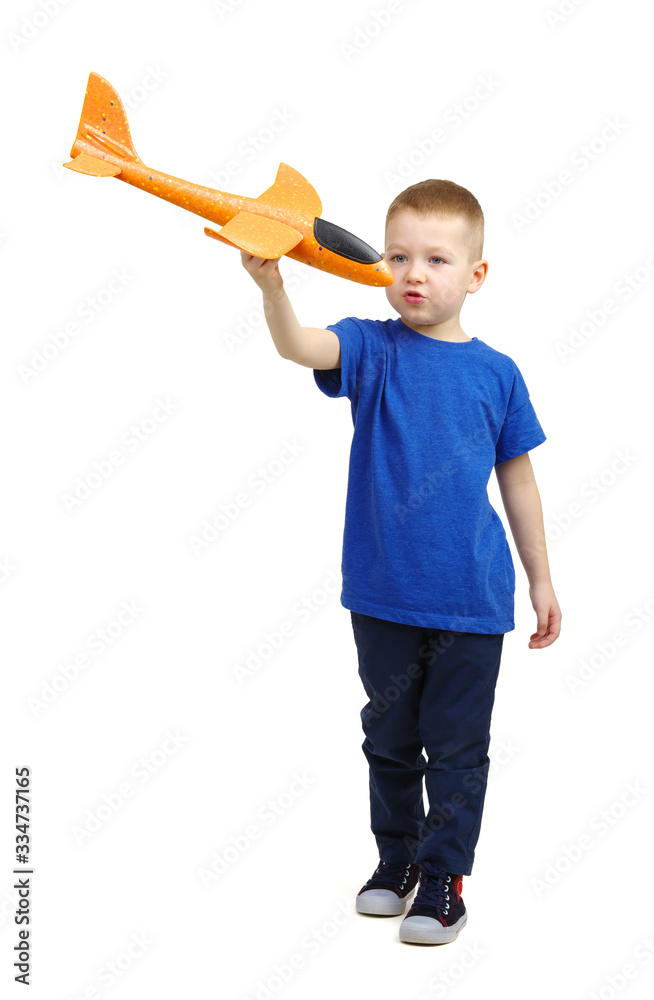 Boy with toy plane