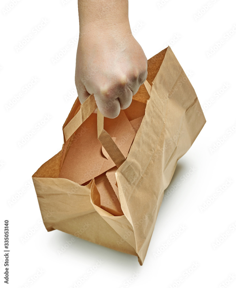 paper bag in human hand