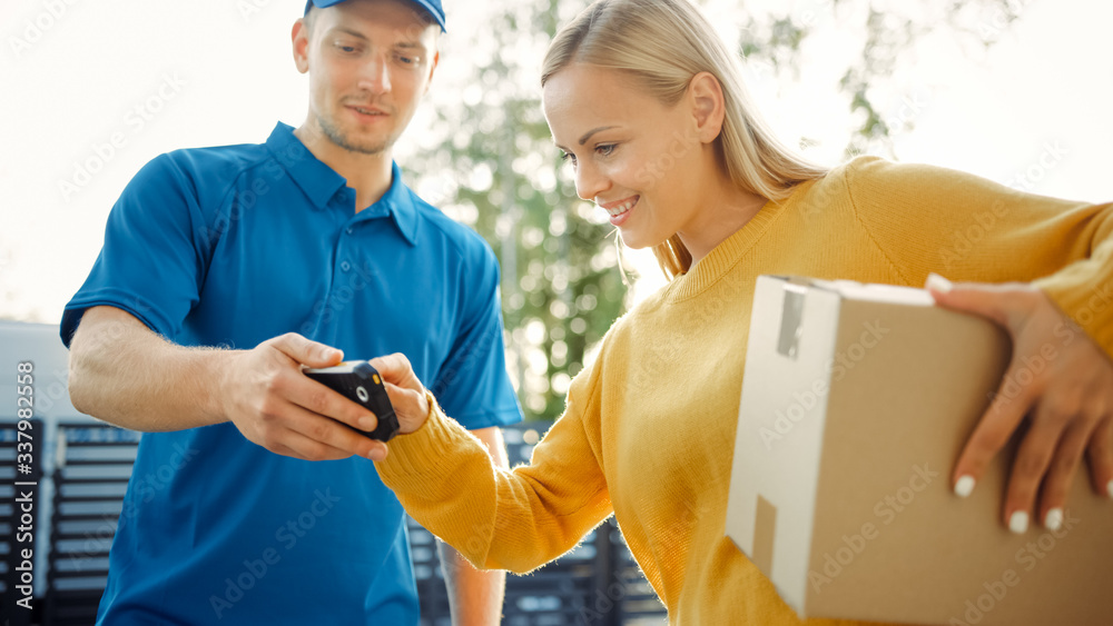 Beautiful Young Woman Meets Delivery Man who Gives Her Cardboard Box Package, She Signs Electronic S