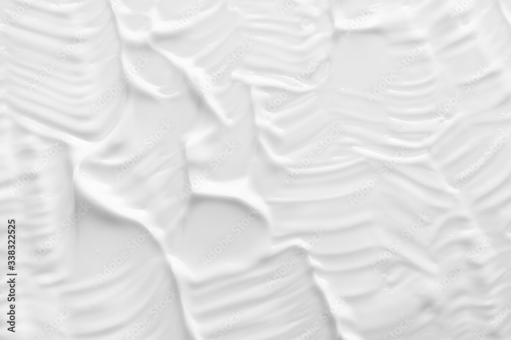 White cosmetic cream texture. Skin care lotion, moisturizer, creamy product strokes closeup
