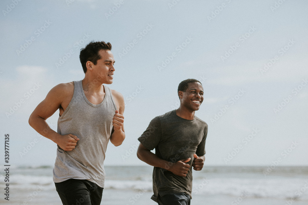 Healthy friends jogging together