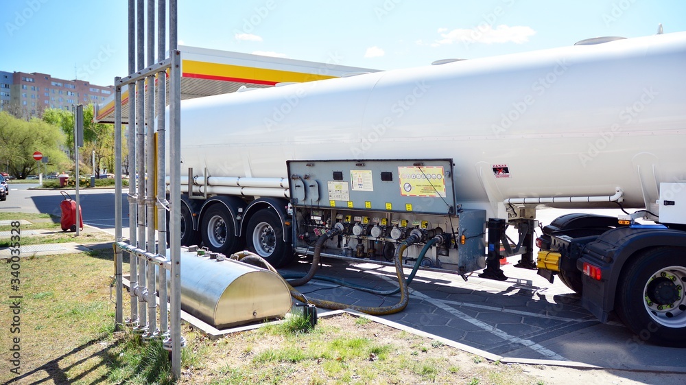 Fuel Tanker Truck at the Gas Station. Refuelling a gas-station.