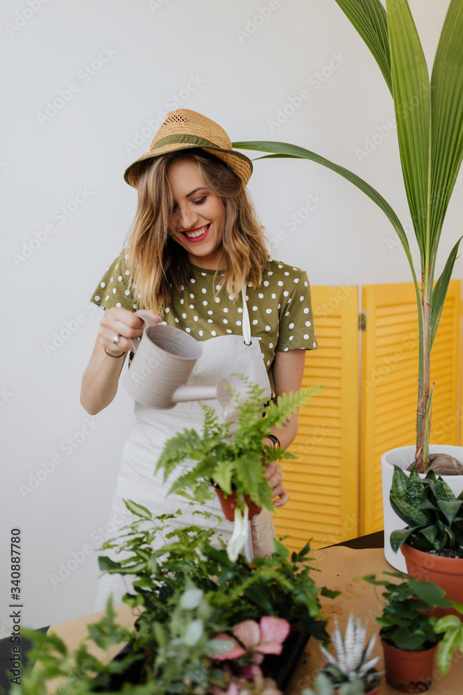 Woman tending to her plants
