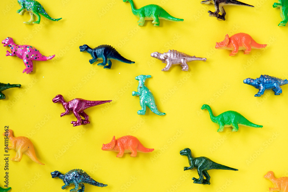 Various animal toy figures in a colorful background