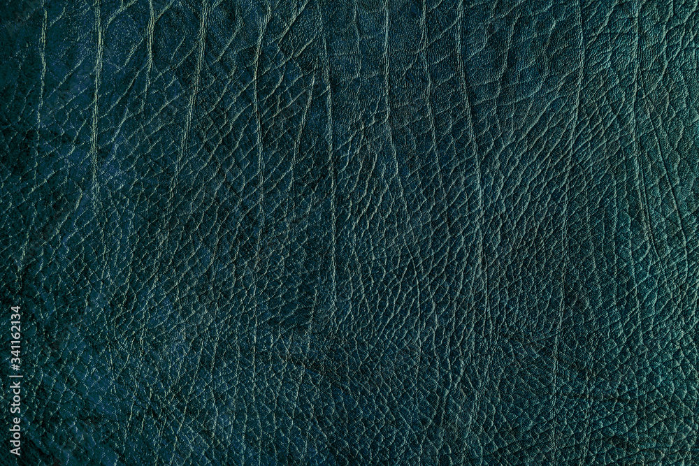 Blue creased leather textured background