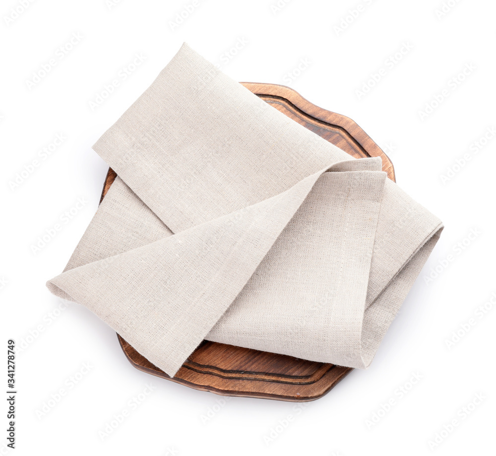 Clean napkins with cutting board on white background