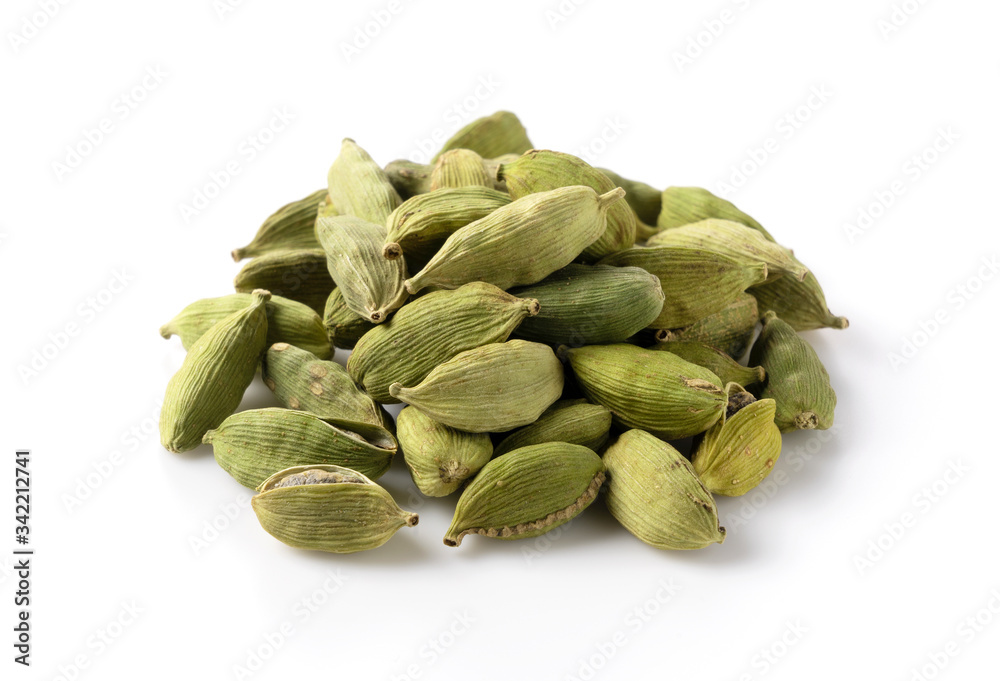 Cardamom seeds placed on a white background