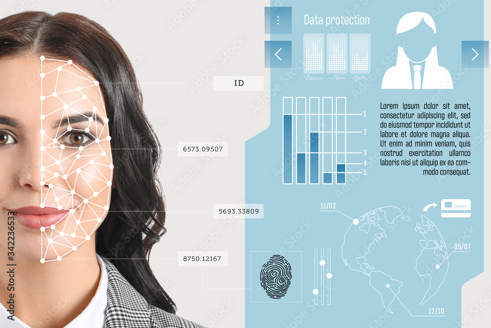 Young businesswoman using facial recognition system for data protection
