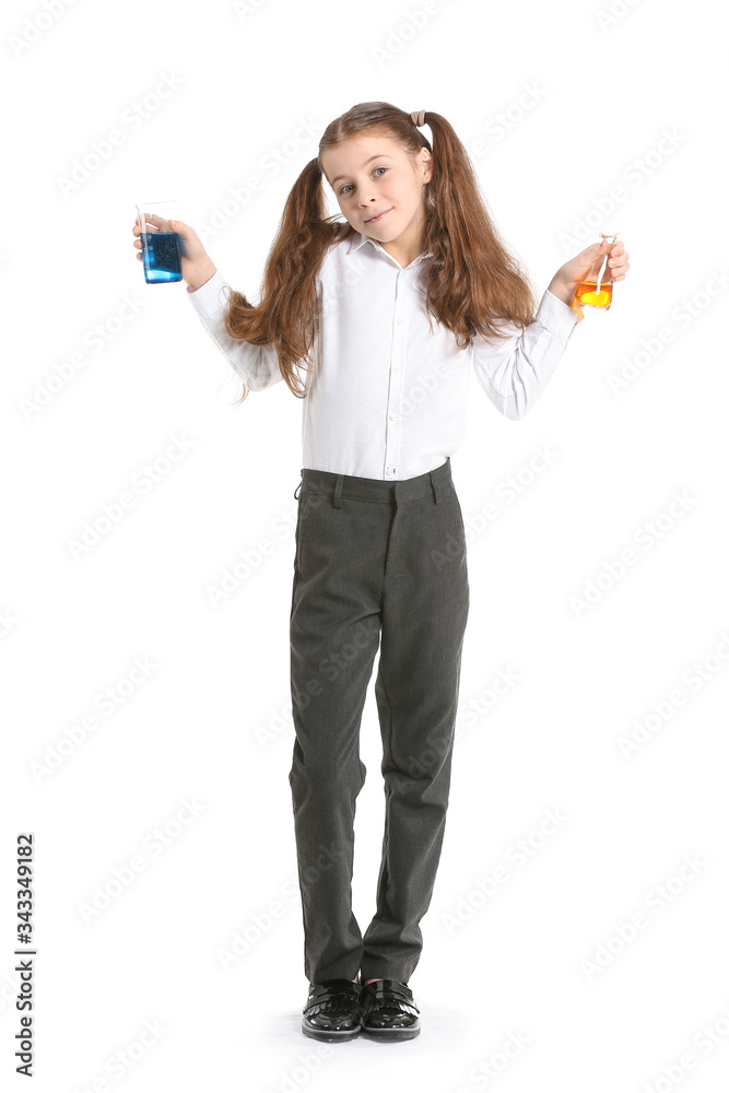 Cute little girl with laboratory glassware on white background