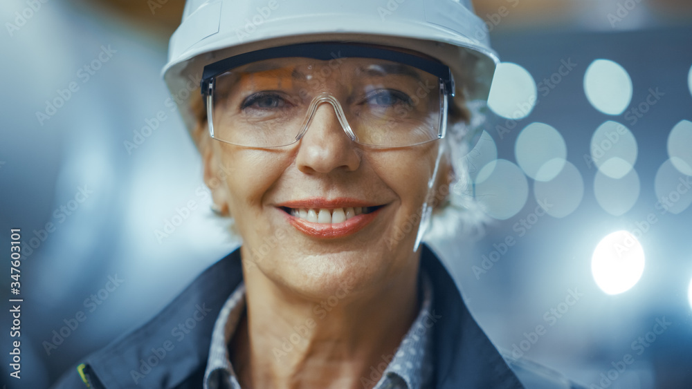 Portrait of Professional Heavy Industry Female Engineer Wearing Safety Uniform and Hard Hat, Glasses