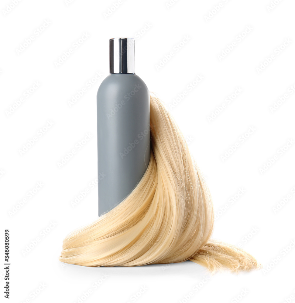 Bottle of shampoo for blonde hair on white background