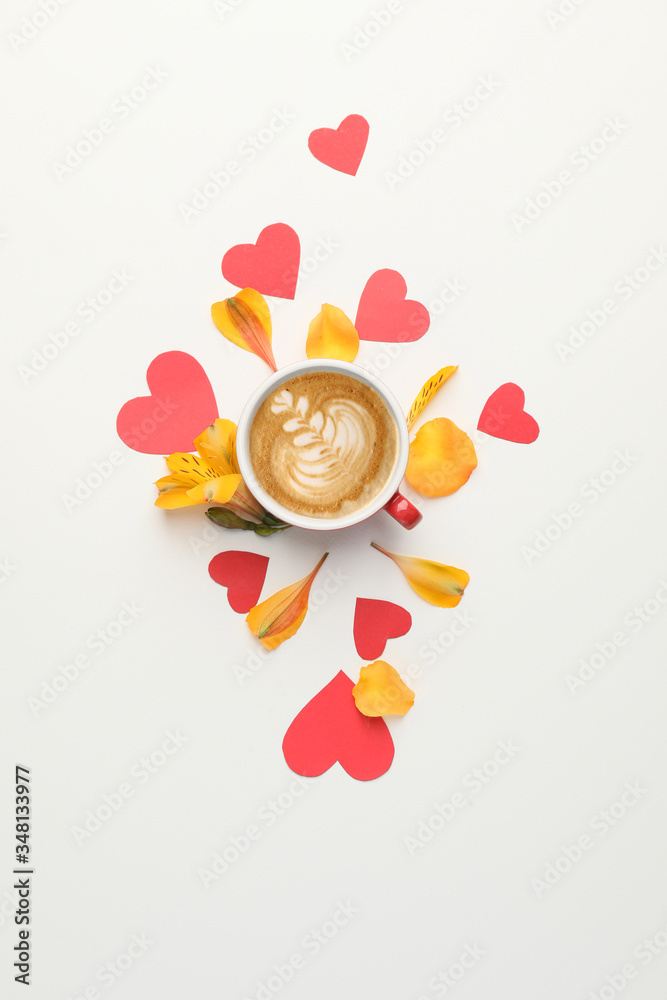 Beautiful composition with cup of tasty cappuccino on white background