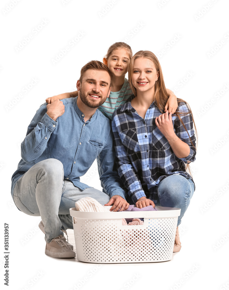 Family with laundry on white background