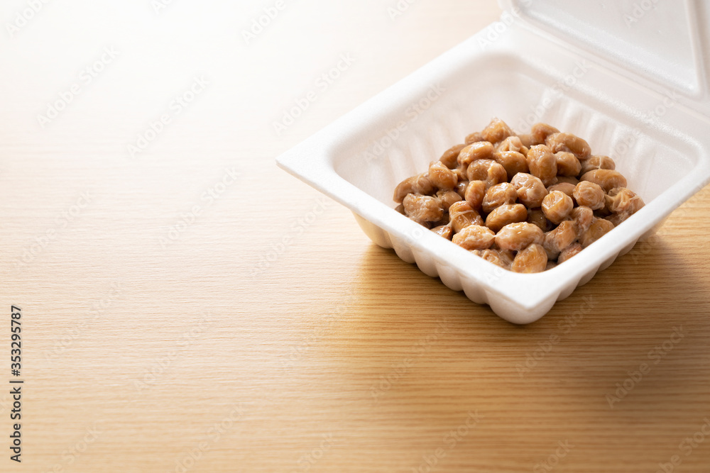Natto placed on a wooden background