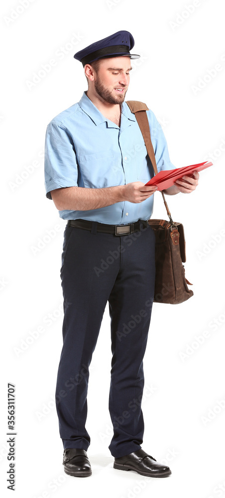 Handsome young postman on white background