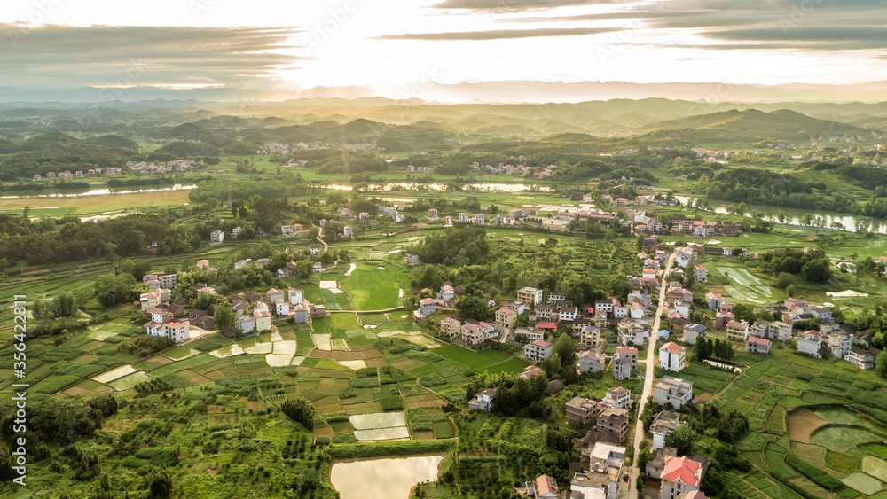 Rural countryside aerial view, green countryside and villages, Hunan, China。