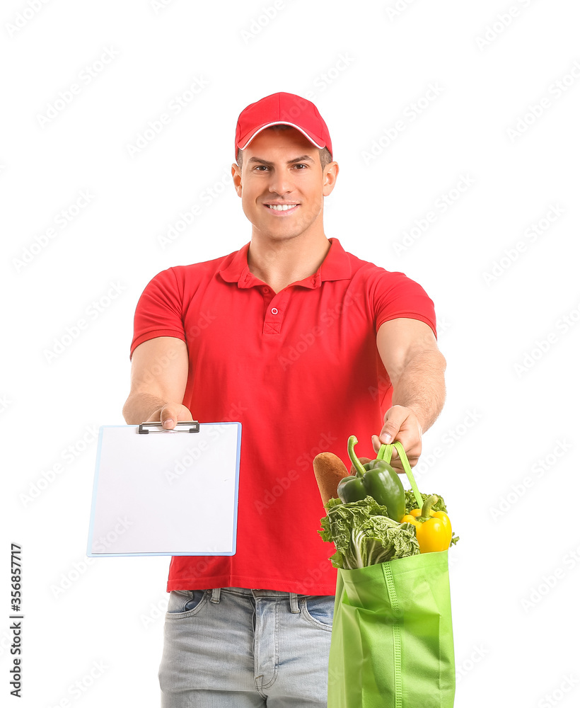 Delivery man with food in bag and clipboard on white background