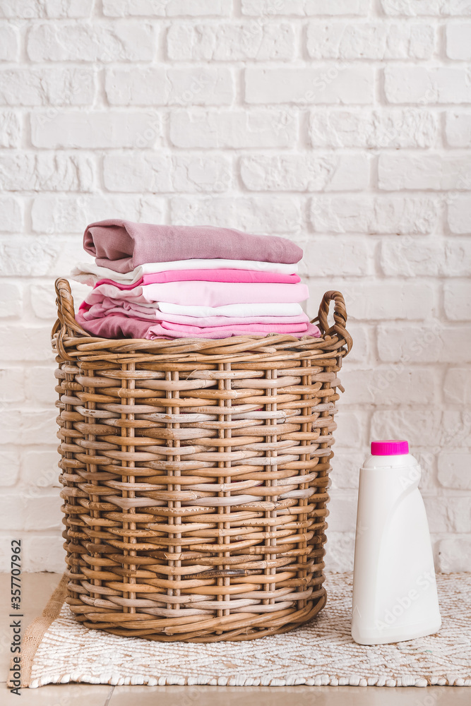 Basket with laundry in room
