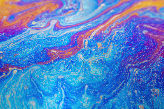 彩虹色涂料的抽象背景纹理。肥皂泡