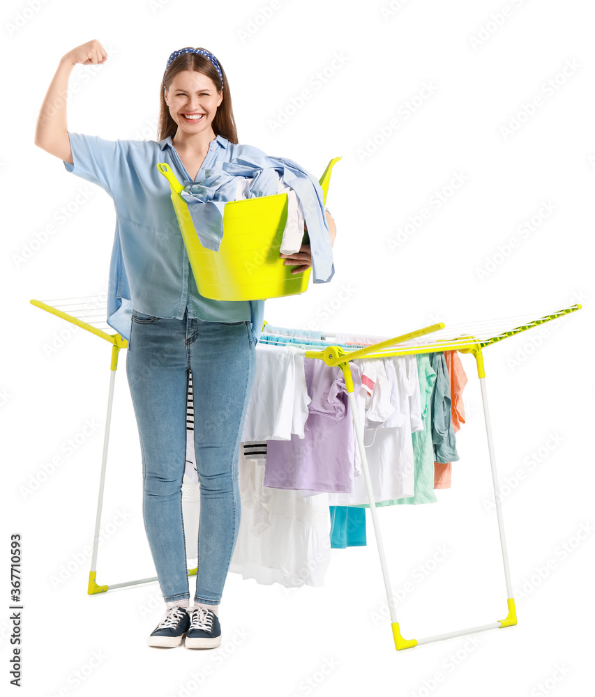 Woman with clean clothes and dryer on white background