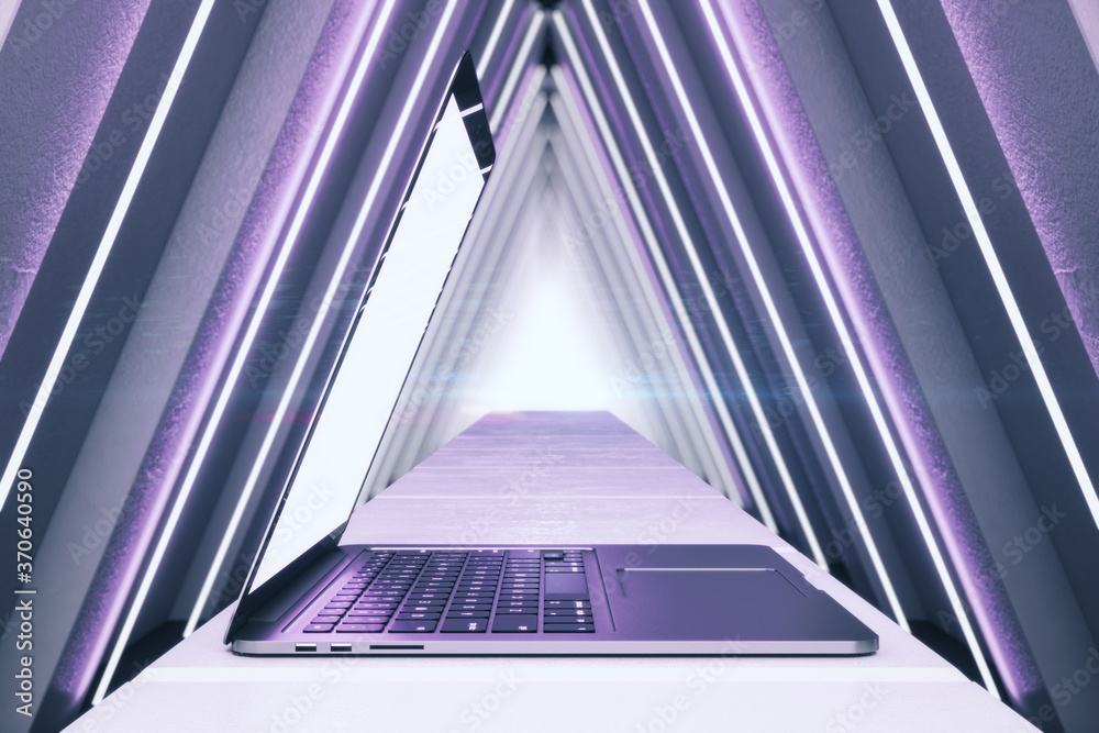 紫色内饰，配有开放式笔记本电脑和发光的三角形走廊。