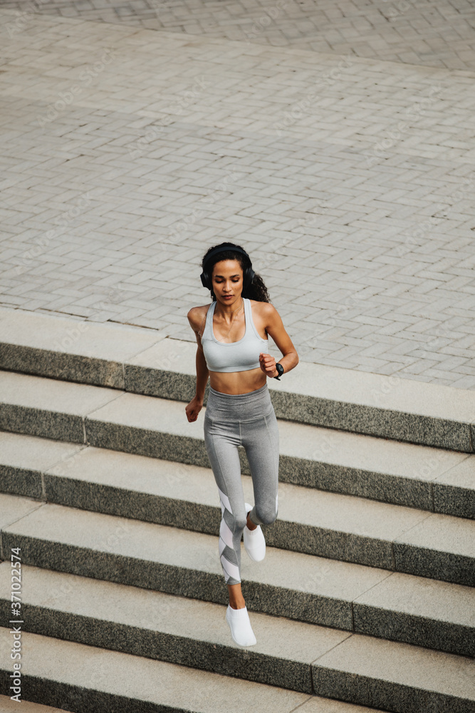 Sporty woman doing running workout