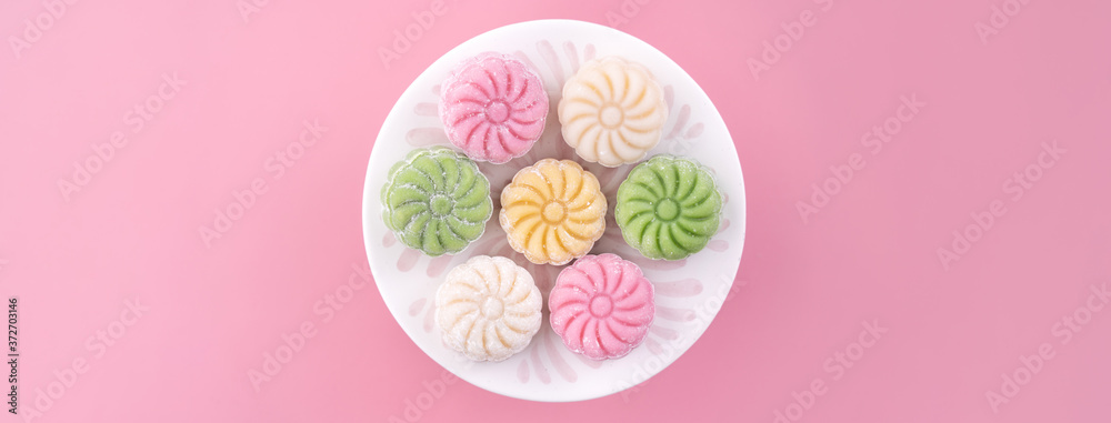Colorful snow skin moon cake, sweet snowy mooncake, traditional savory dessert for Mid-Autumn Festiv