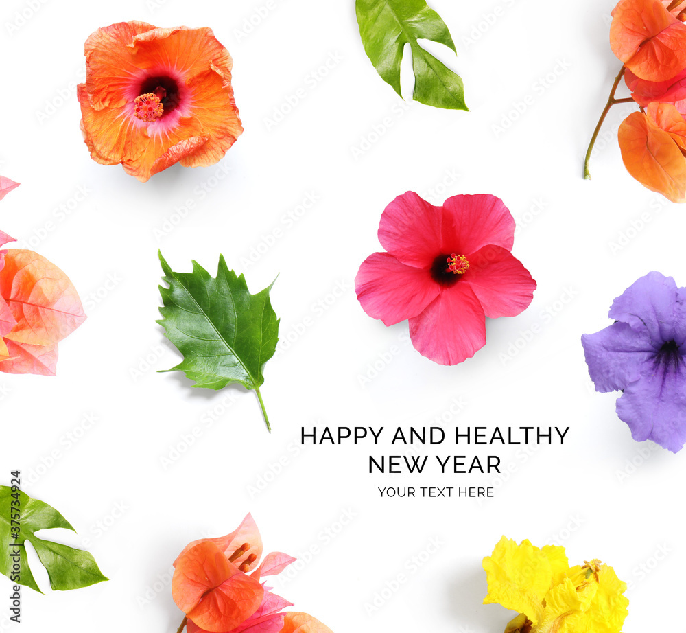 白色背景上用鲜花制作的创意快乐健康新年贺卡。鲜花快乐新