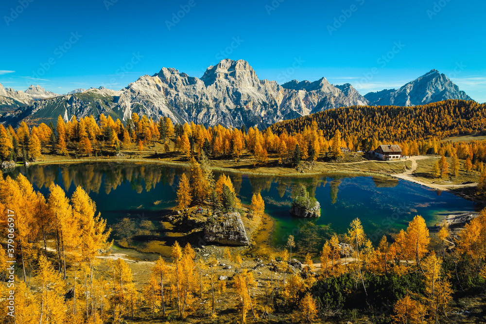 Famous Federa lake in the autumn forest, Dolomites, Italy