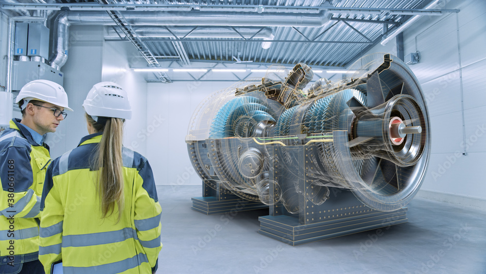 工业4.0：两位工程师站着，在工厂车间与增强现实3D涡轮机交谈