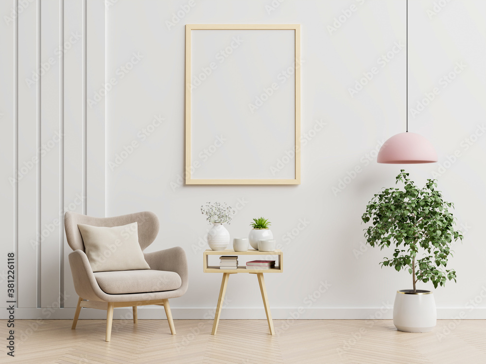 Poster mockup with vertical frames on empty white wall in living room interior with blue velvet armc