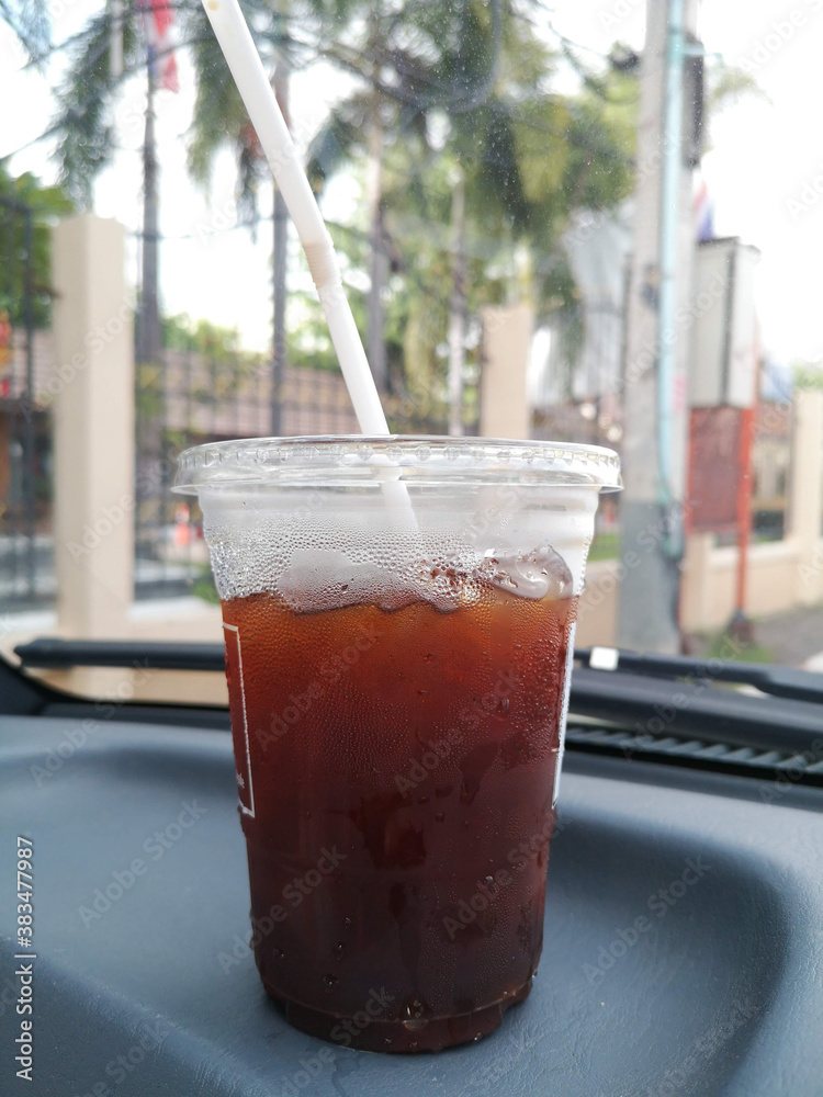 Iced black coffee placed in the car