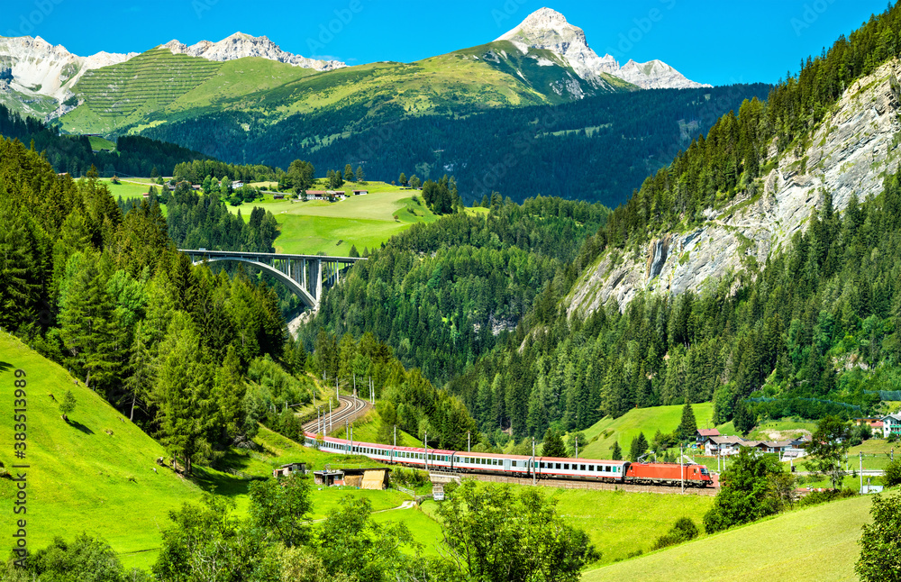 Passenger train at the Brenner Railway in the Austrian Alps