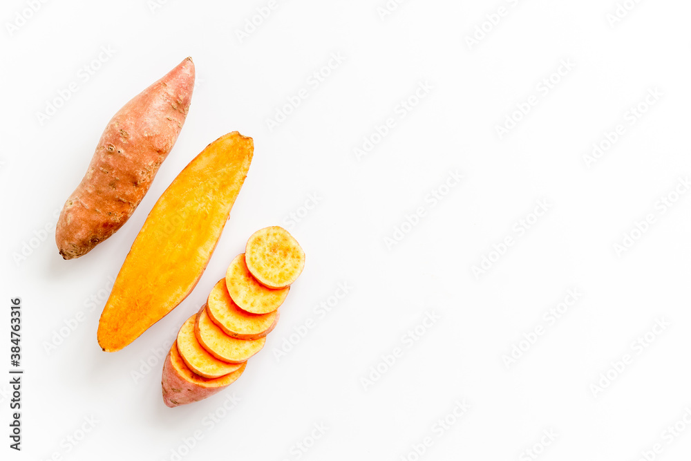 Flat lay of sweet potatoes - yams vegetables, top view