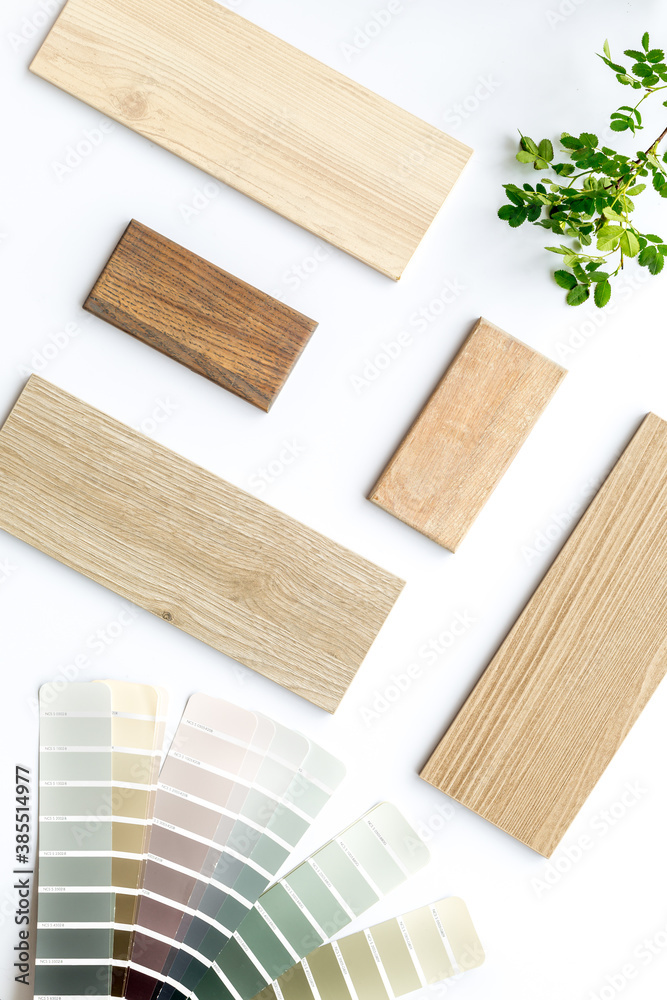 Color scheme with samples of material - kitchen countertops and wooden cabinet. Flat lay