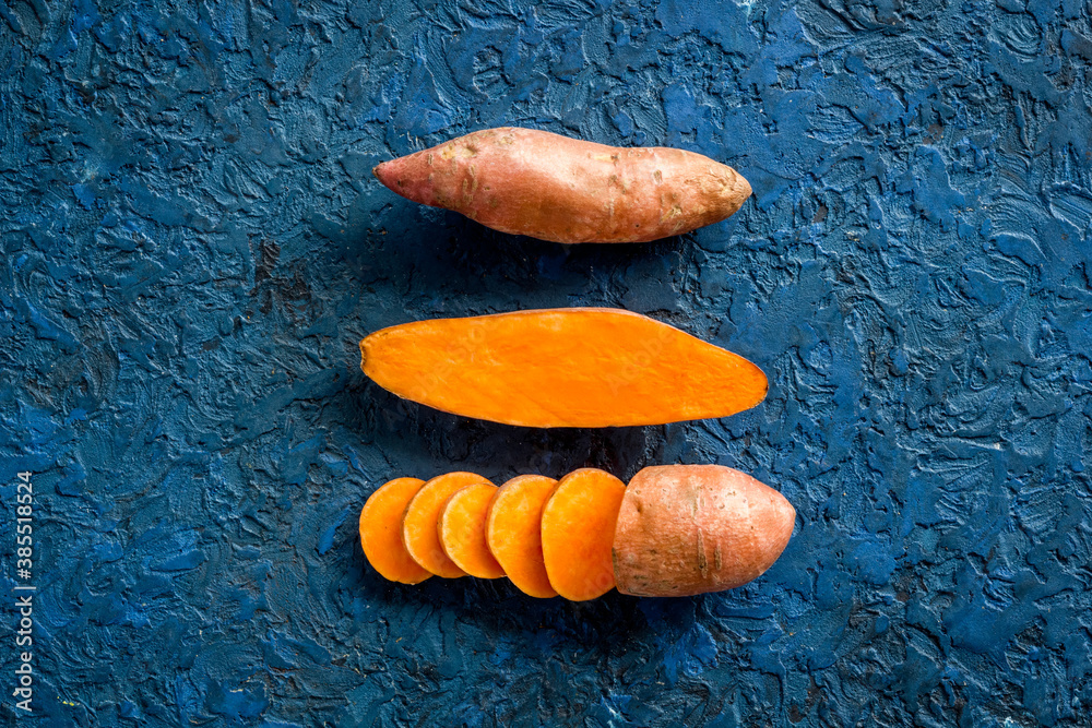 Flat lay of sweet potatoes - yams vegetables, top view