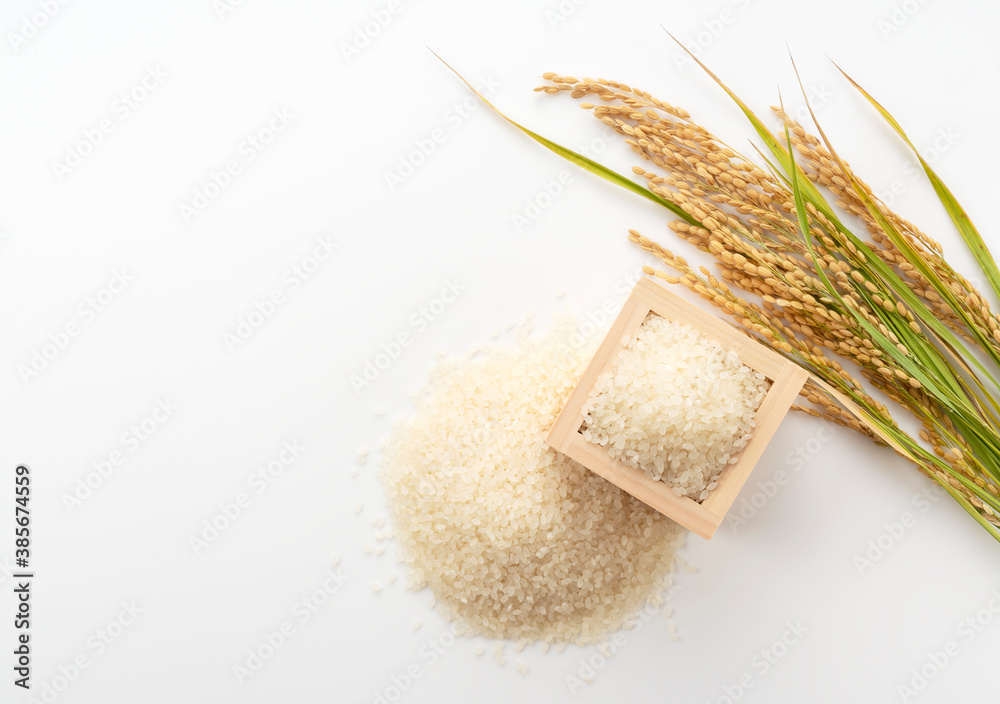 White rice, Masu and ears of rice on a white background
