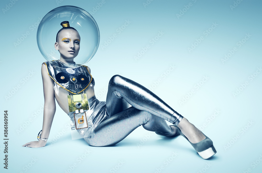 cyborg woman sitting on the floor in glass helmet