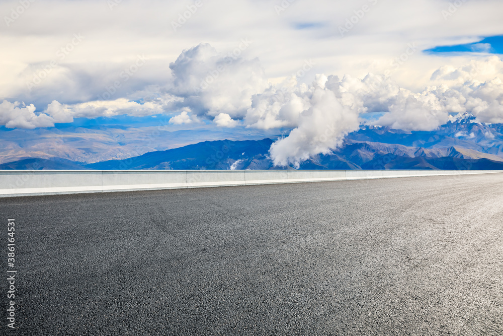 New asphalt road and mountain with sky cloud natural scenery.