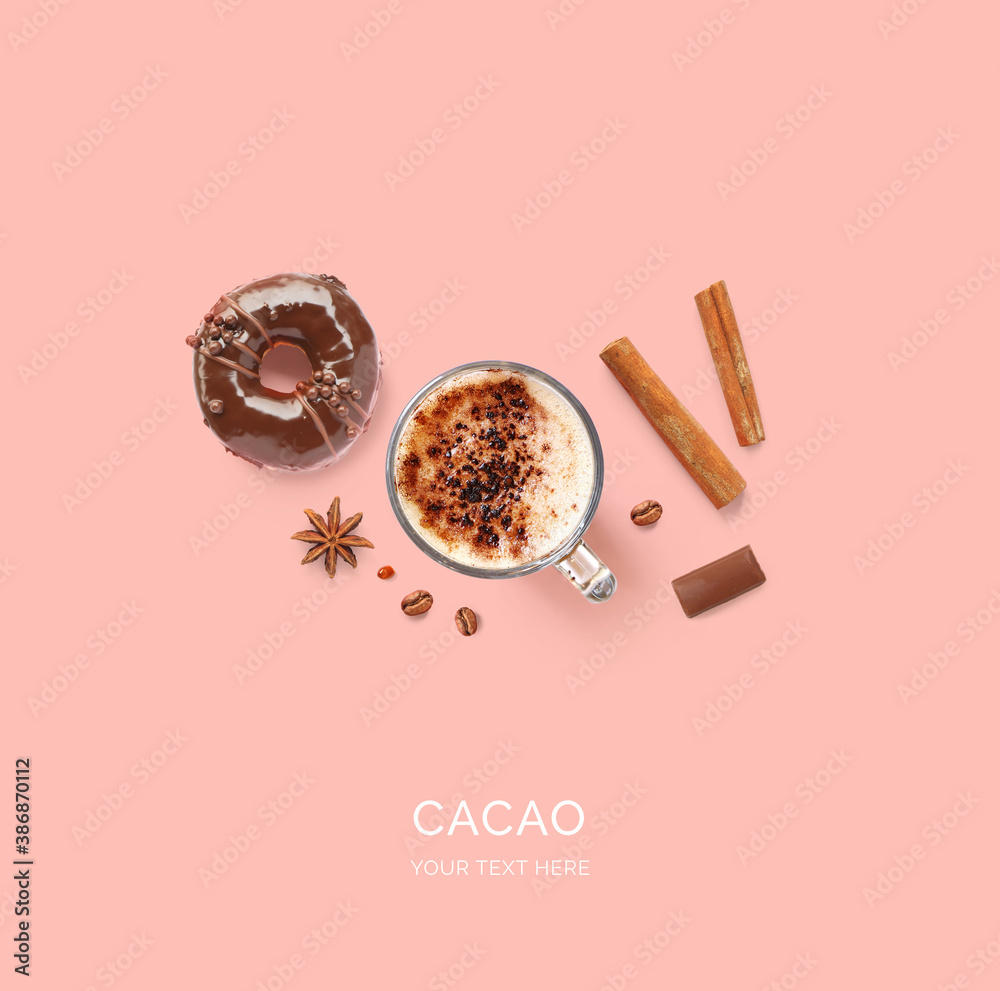 Creative layout made of cacao drink and donut on the pink background. Flat lay. Food concept.