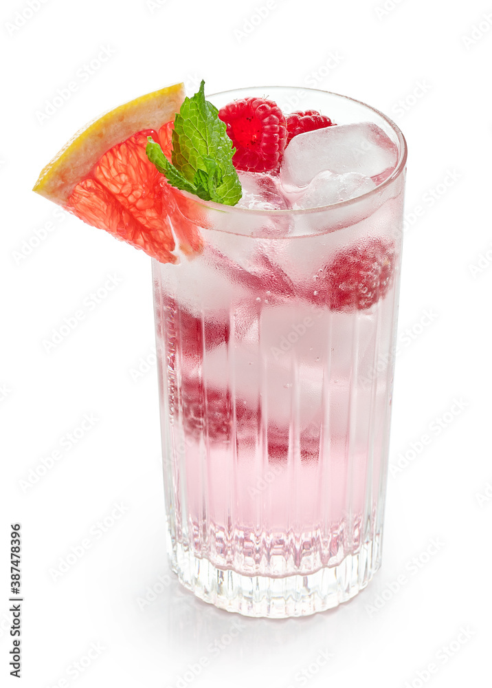 glass of iced drink with fresh raspberries