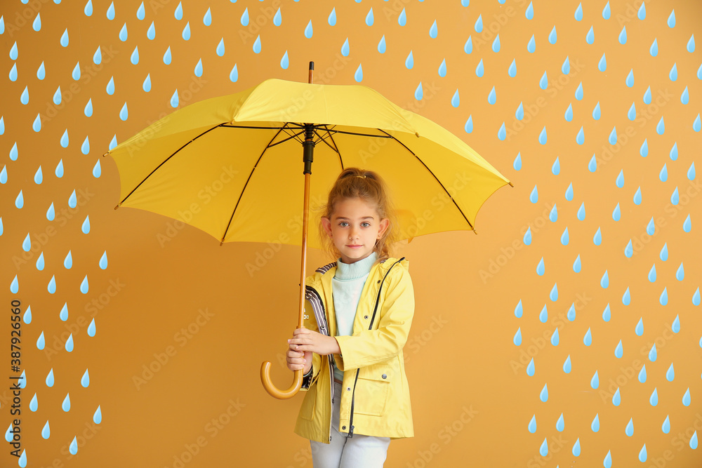 Cute little girl holding umbrella on color background with drawn rain