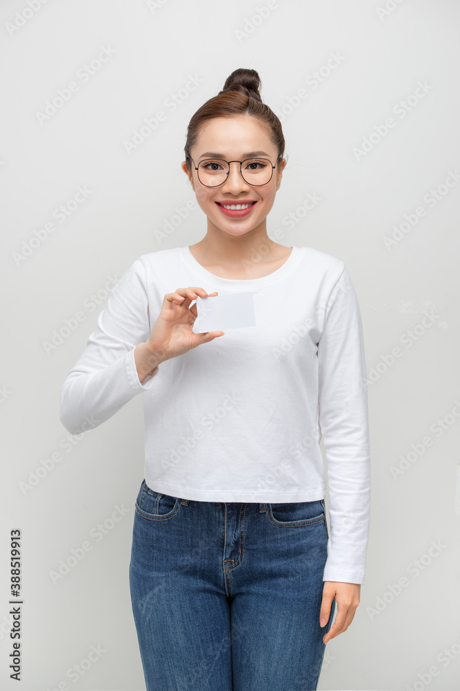 Casual style smiling woman portrait show blank card.