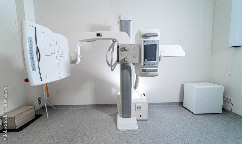 X-ray equipment in modern clinic. Up-to-date apparatus. Selective focus. Closeup.