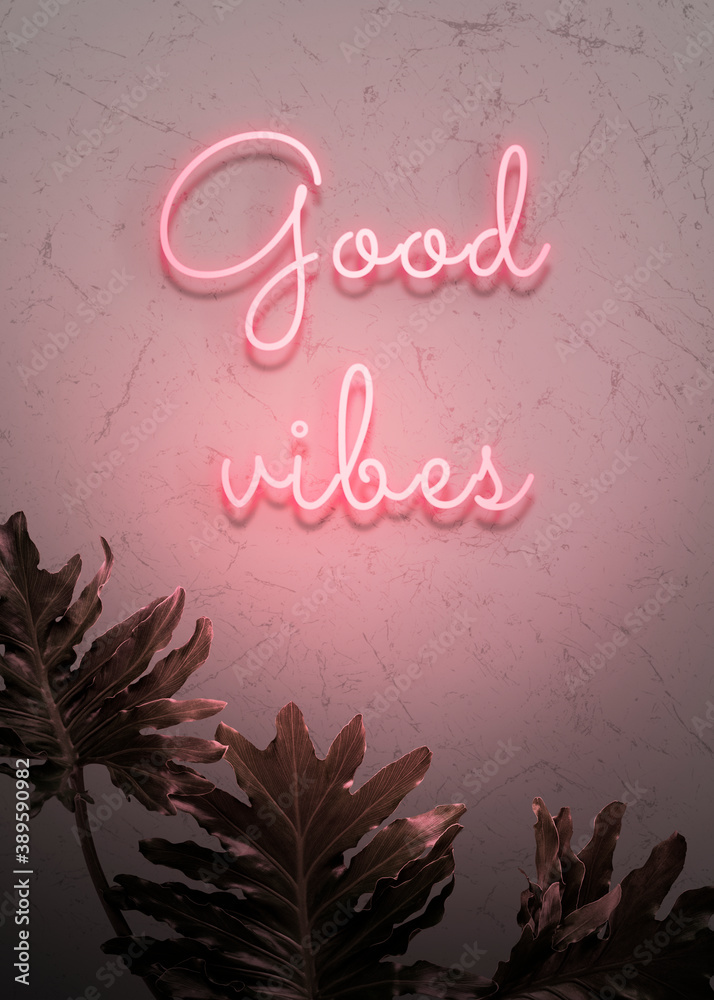 Neon red good vibes on a wall
