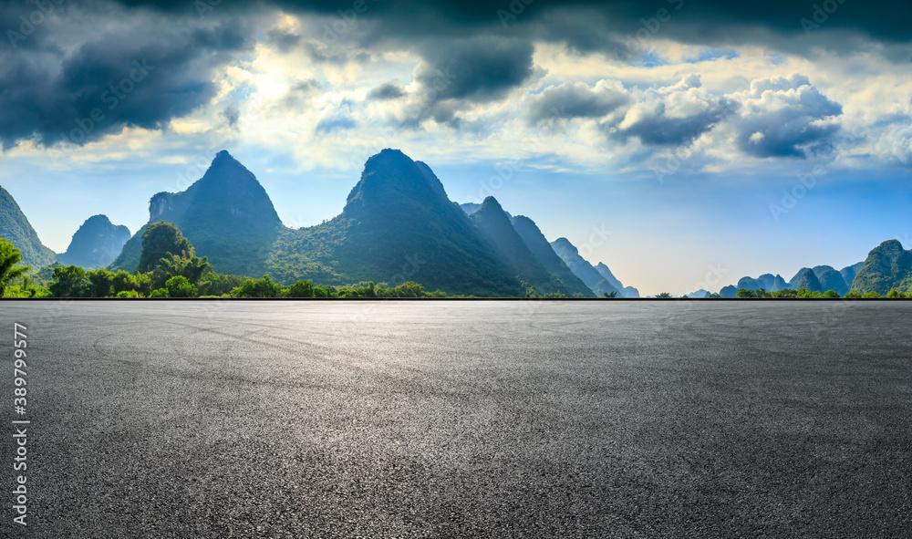 Asphalt race track and green mountain natural scenery in Guilin,China.