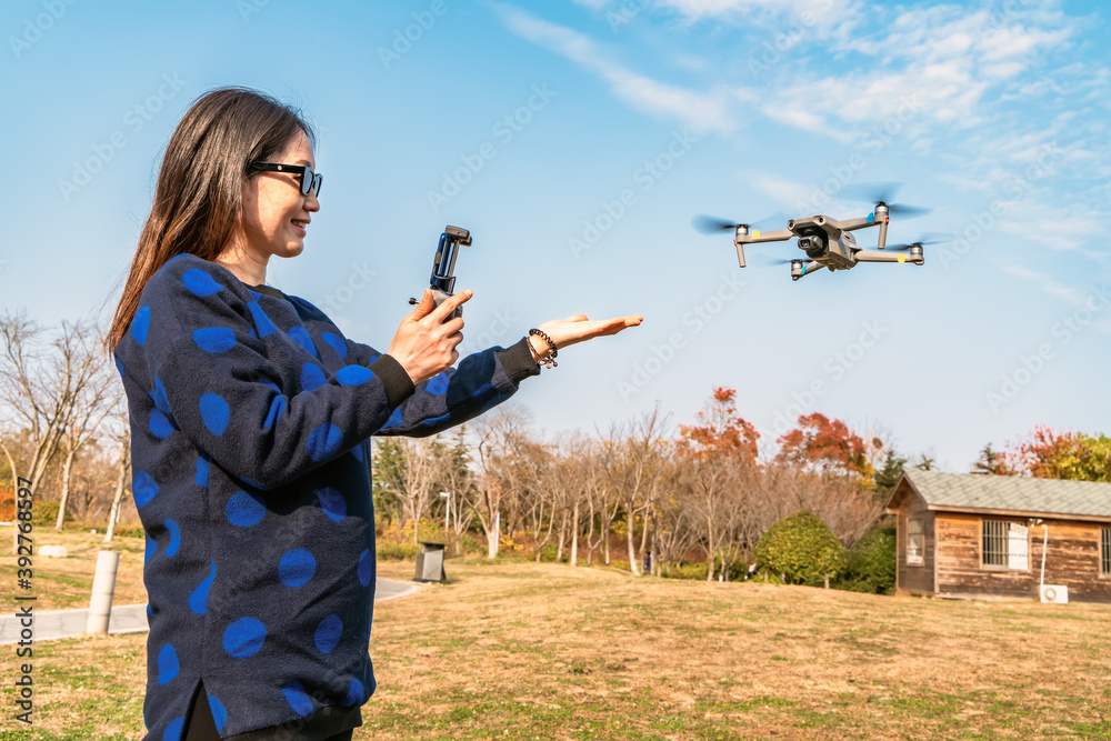Drones and camera women in the park