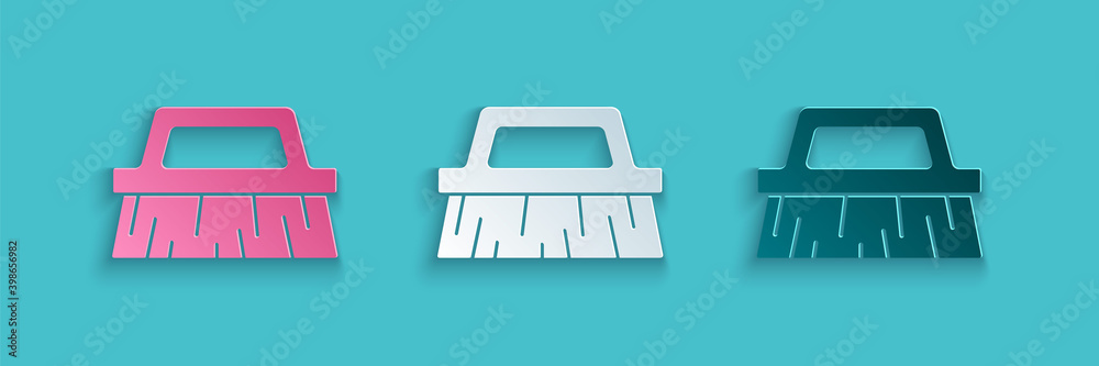 Paper cut Brush for cleaning icon isolated on blue background. Paper art style. Vector.